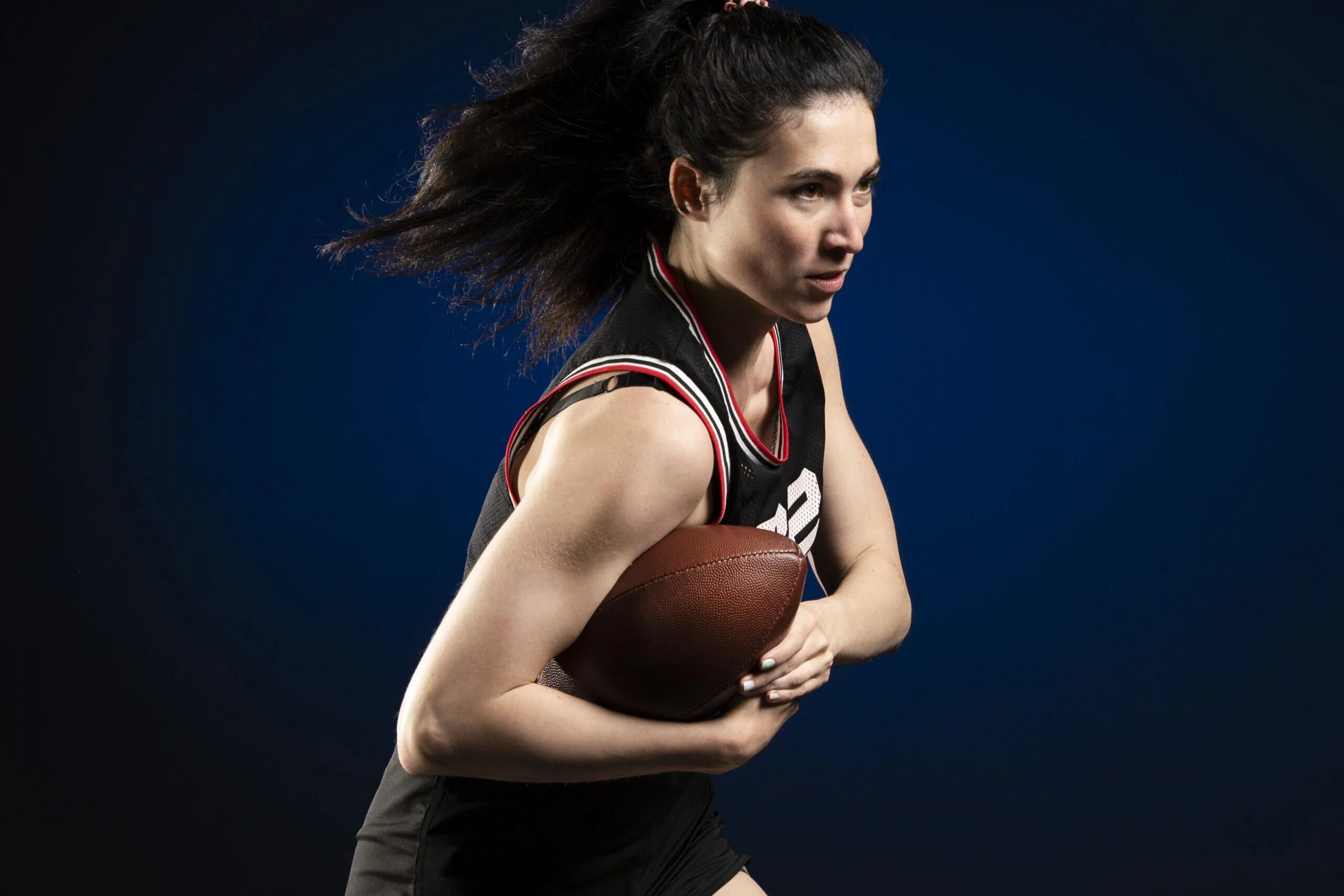 female rugby player sportswear posing