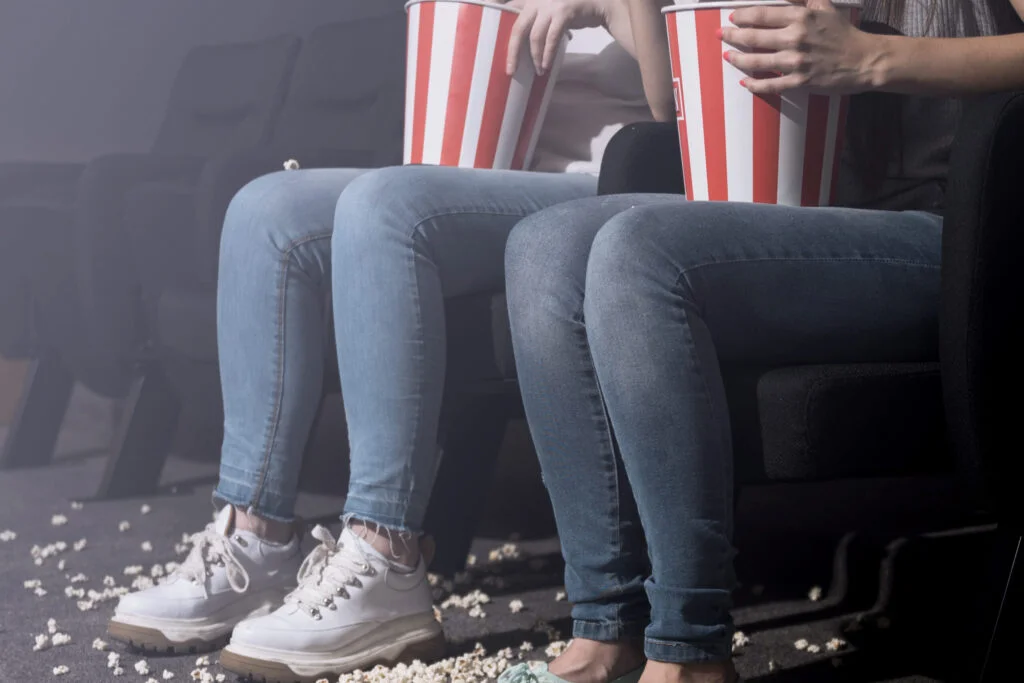girls with popcorn cinema