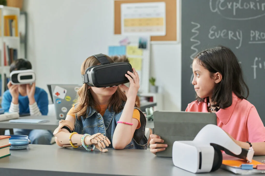 Education System: Are We Preparing the Future Generation? girls using virtual reality technology in school